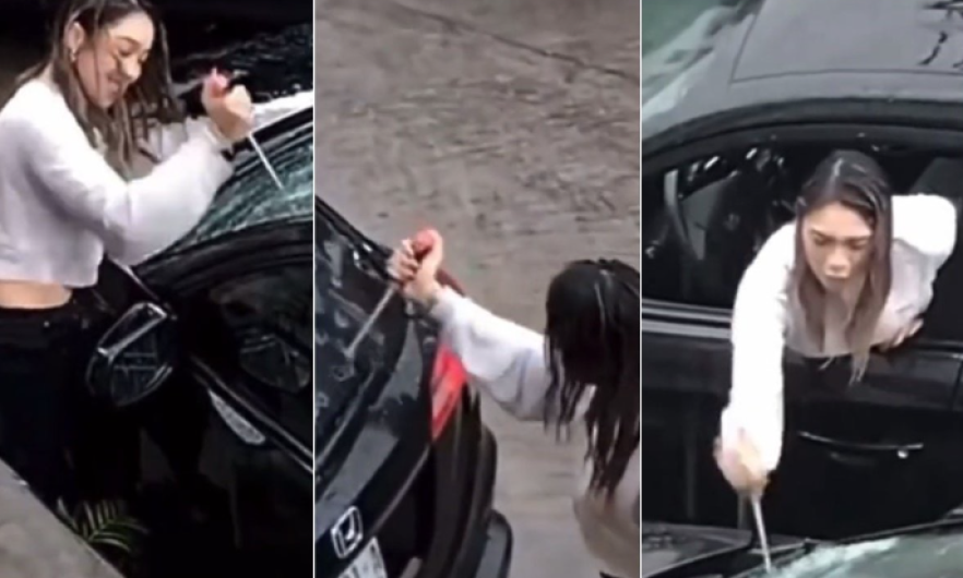 Mujer destroza auto de su pareja por supuesta infidelidad 