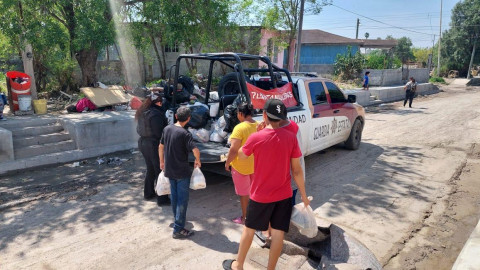 Preserva Guardia Estatal seguridad y entrega donativos en sectores afectados por inundación